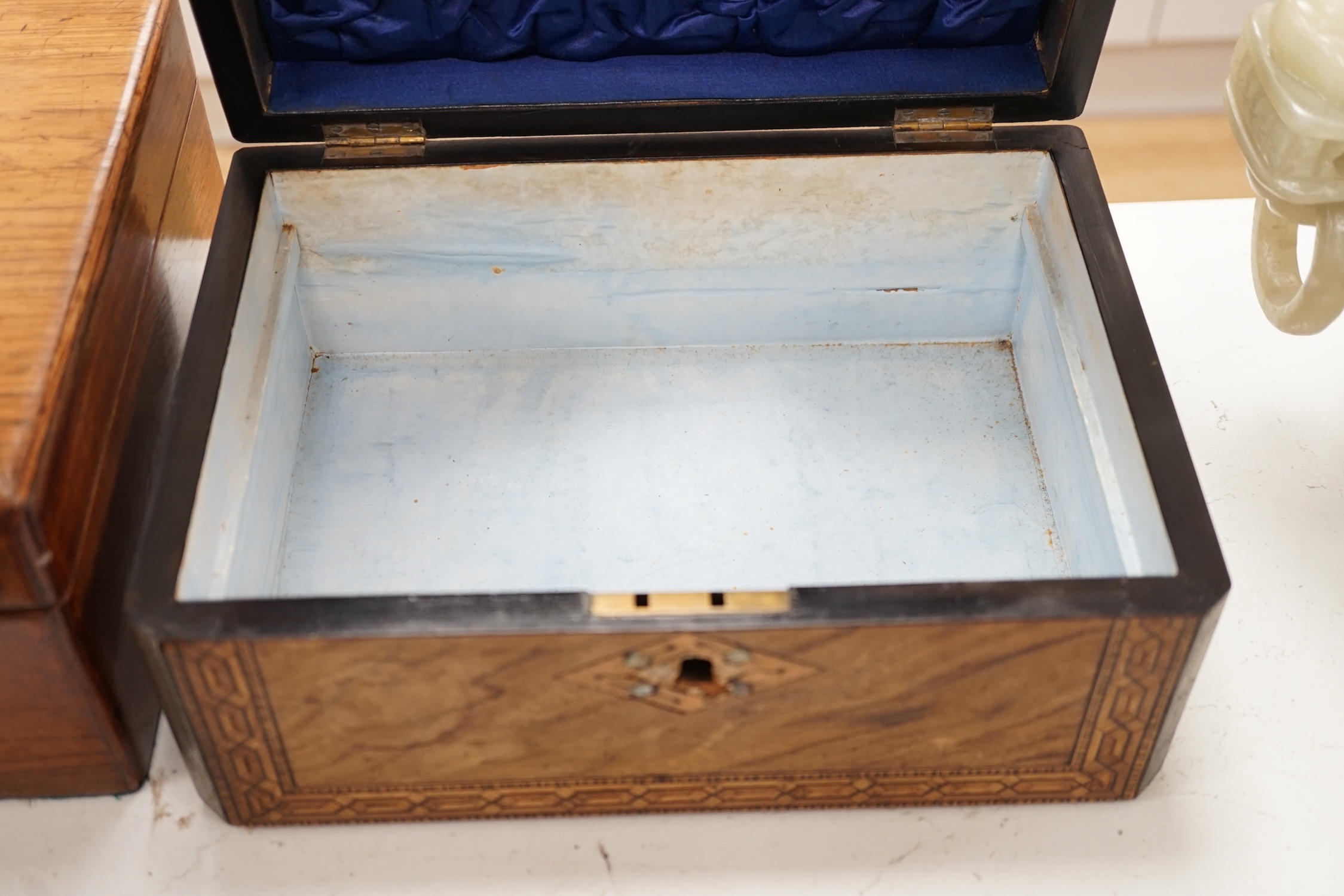 Two Victorian boxes, an amboyna writing slope and a cutlery tray / carrier, largest 33cm wide. Condition - fair